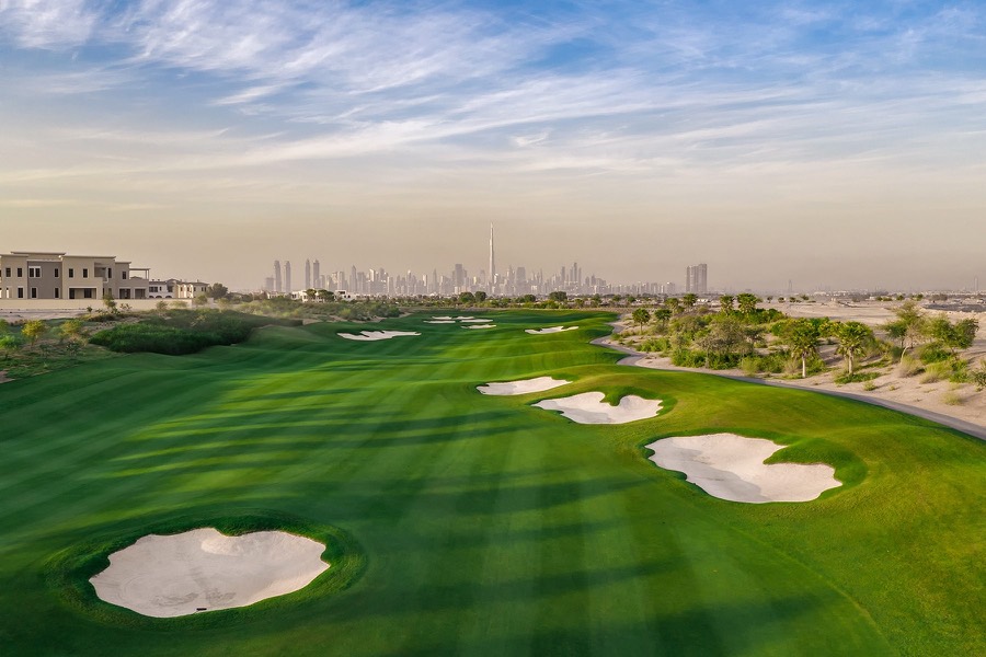 Dubai Hills Golf Club, with the Dubai skyline on the horizon