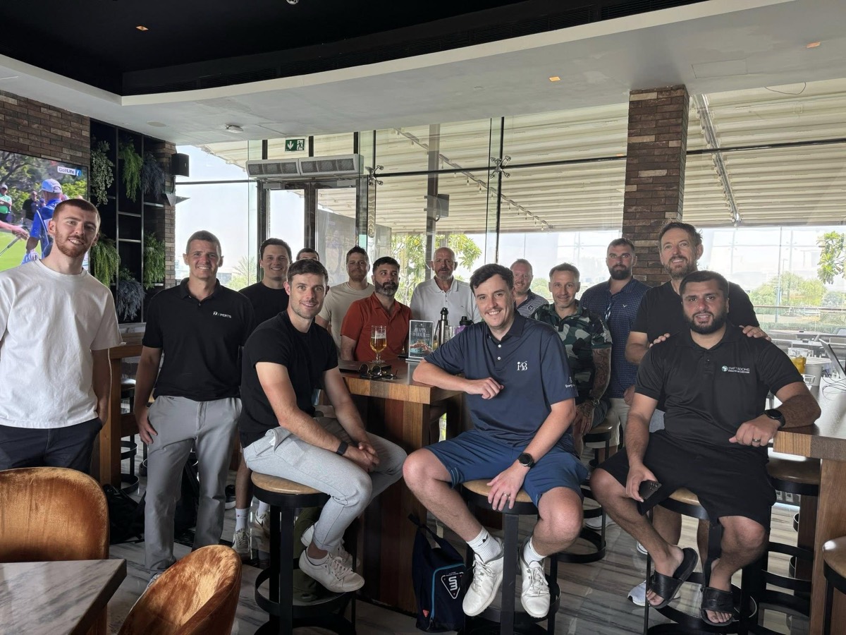 A group of members together in the clubhouse before an event